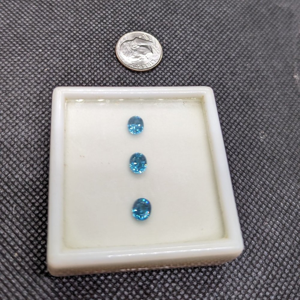 Set of 3 oval blue zircons
